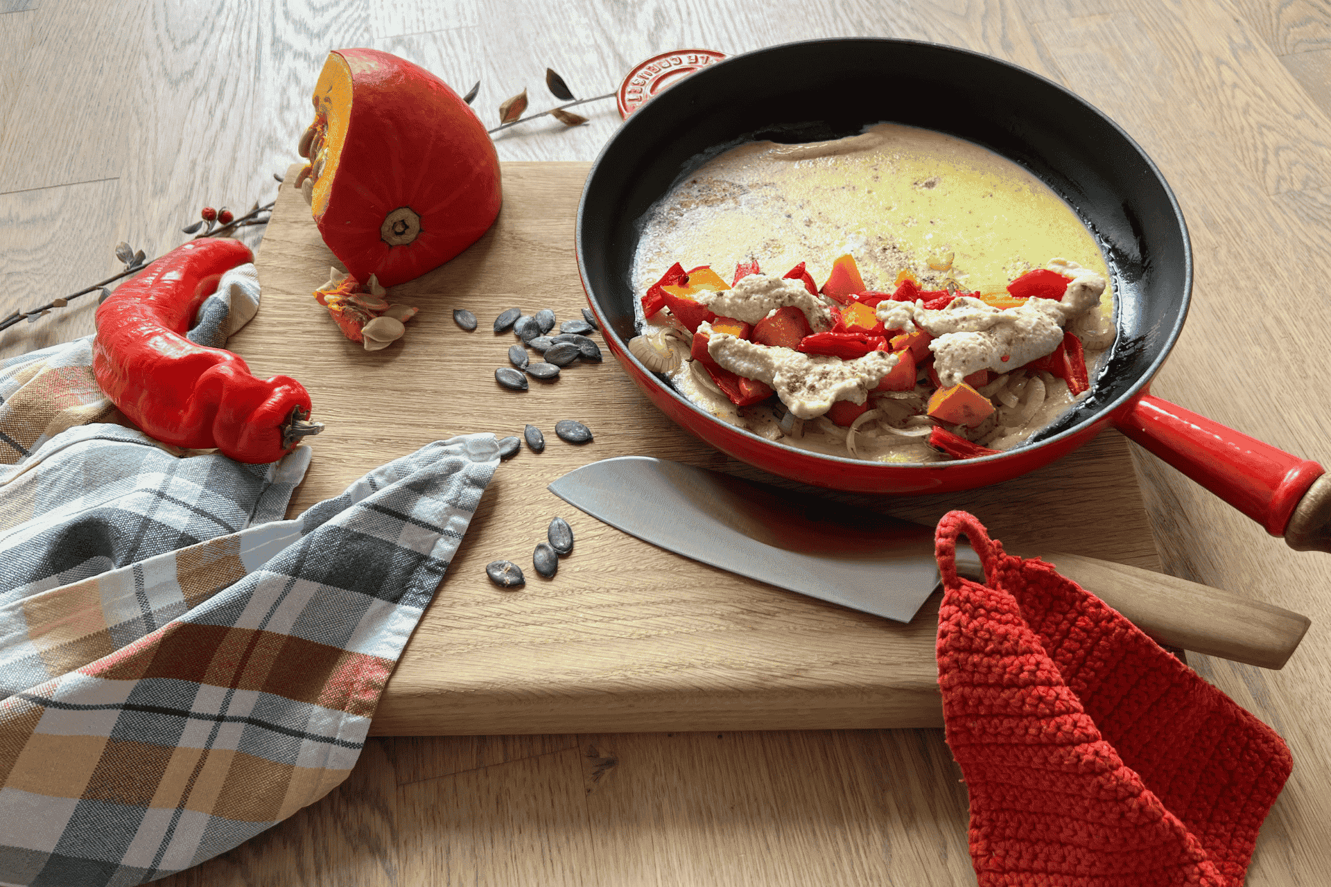 Omlette with pumpkin, bell pepper, onions and hummus.